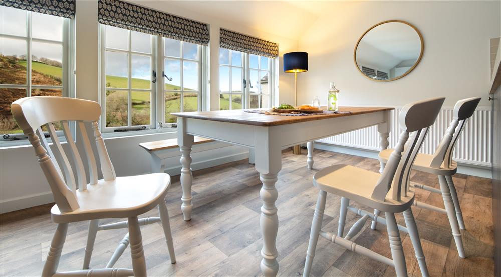 The open-plan kitchen, sitting and dining room (photo 4) at Cloud Farmhouse in Lynton, Devon