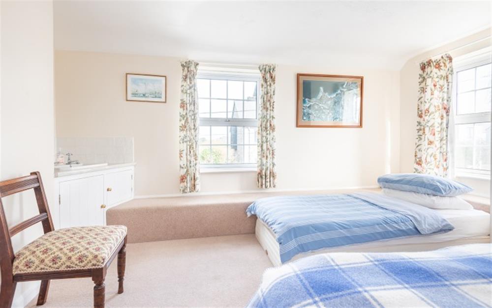Twin bedroom at Clovelly Cottage in Crantock