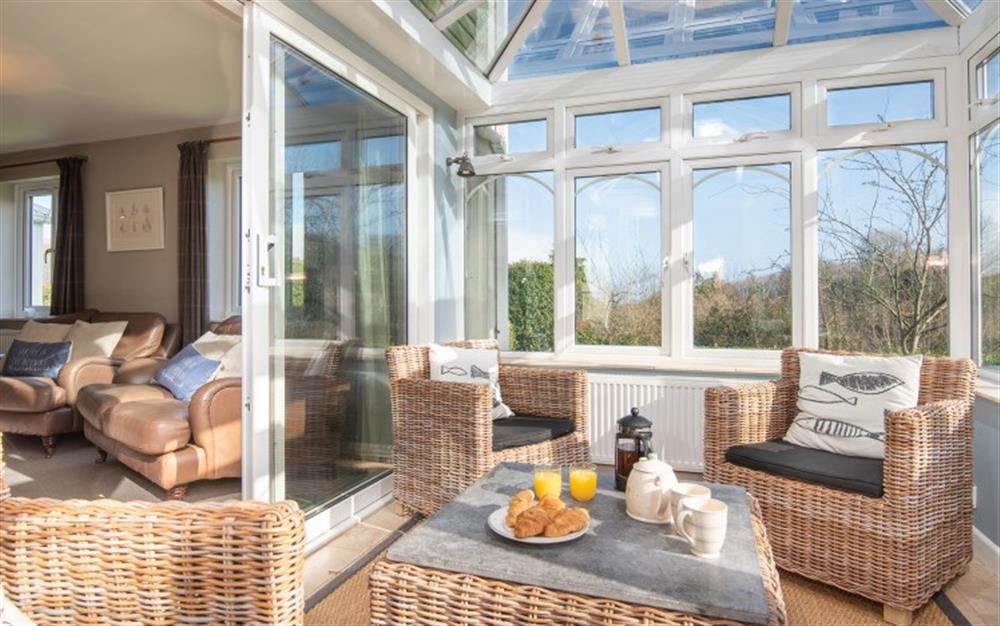 The conservatory gives another space to relax.