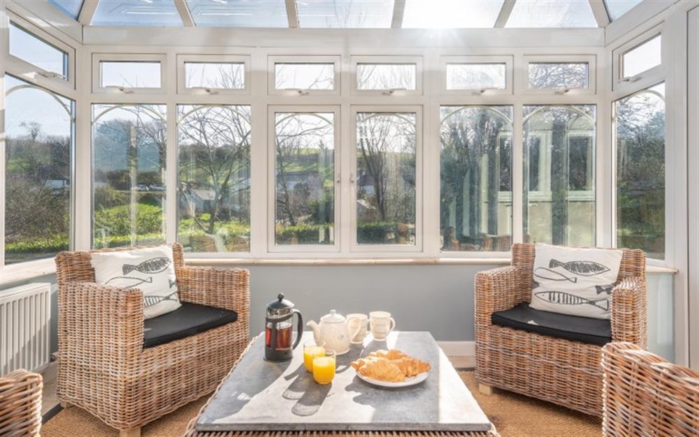 When the sun is hiding, get a feel of al fresco in the conservatory.