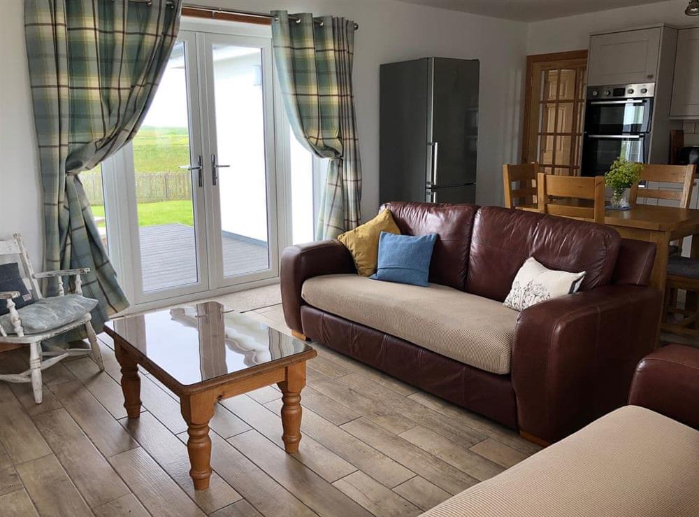 Living area at Clover Cottage in Middlequarter, Isle Of North Uist