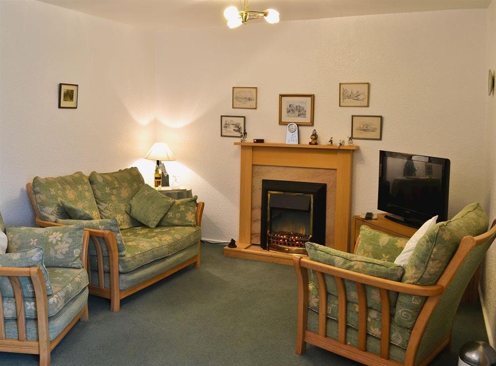 Living room/dining room at Clumber Cottage in Beadnell, near Seahouses, Northumberland