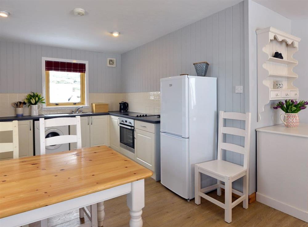 Well-equipped kitchen with convenient dining area at Cluny in Aberfeldy, Perthshire