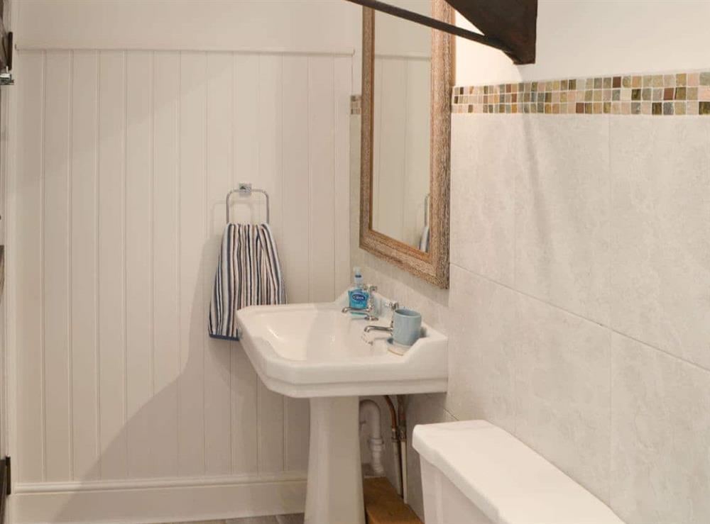 Family shower room at Clutter Cottage in Druridge by-the-Sea, Northumberland., Great Britain