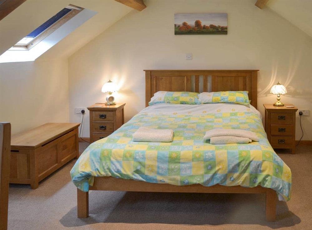 Comfortable double bedroom at Clyst William Barn in Plymtree, Cullompton, Devon