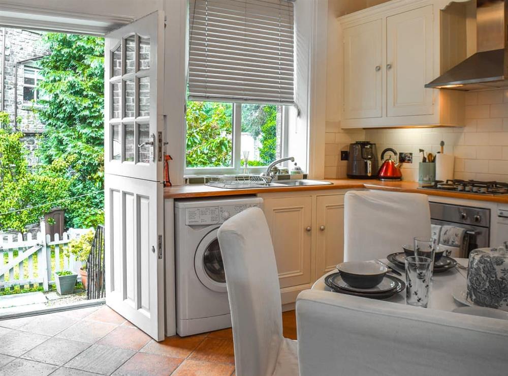 Kitchen/diner at Co-Operative Cottage in Uppermill, Lancashire