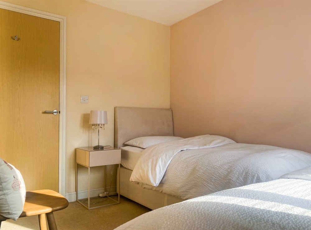 Twin bedroom (photo 2) at Coach House Apartment in Bournemouth, Dorset