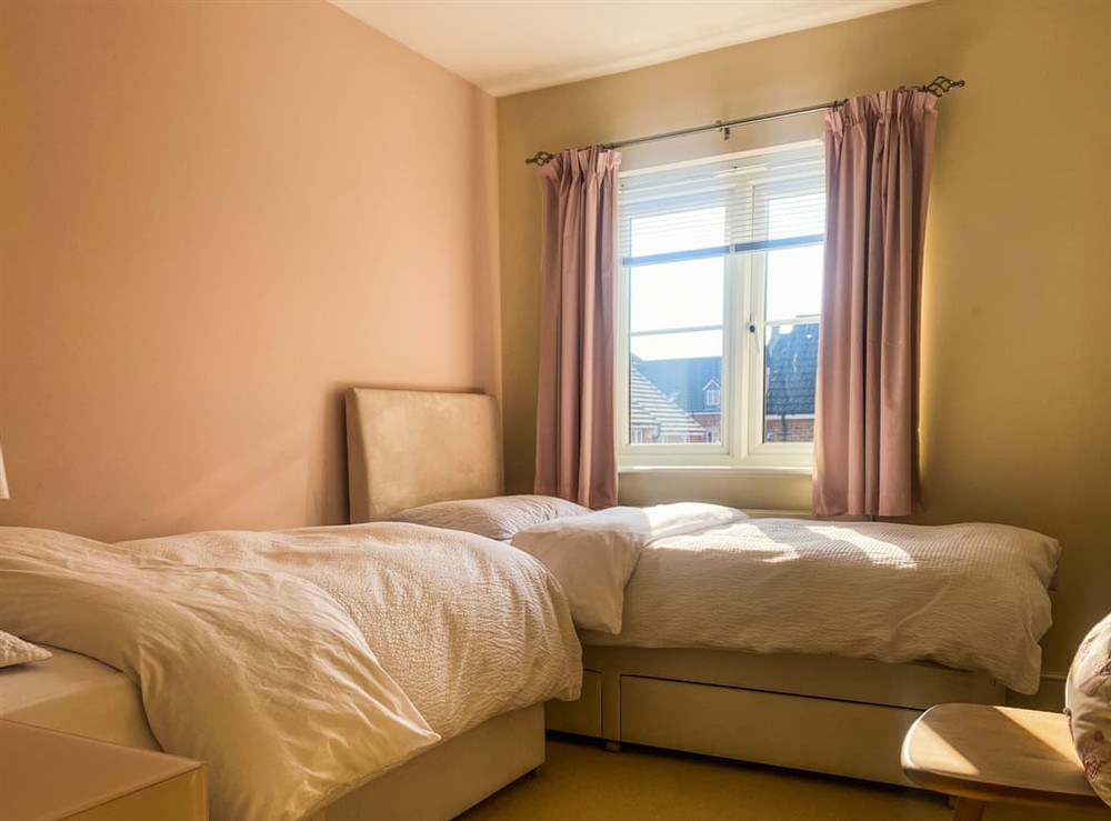 Twin bedroom at Coach House Apartment in Bournemouth, Dorset