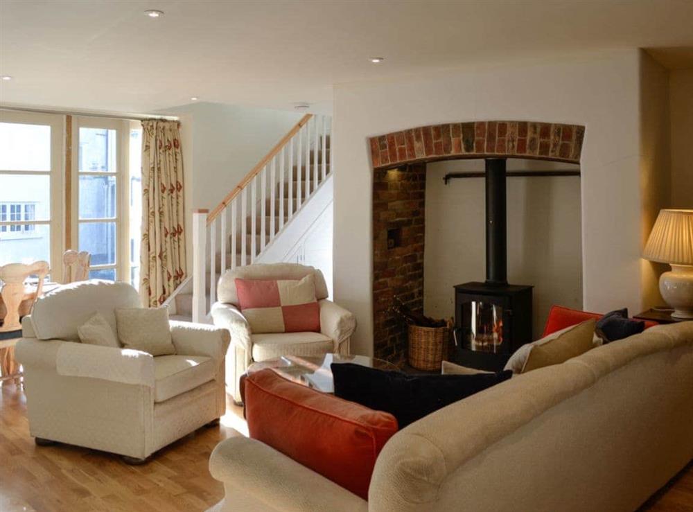 Cosy living room with wood burner at Coach House in Chulmleigh, near South Molton, Devon