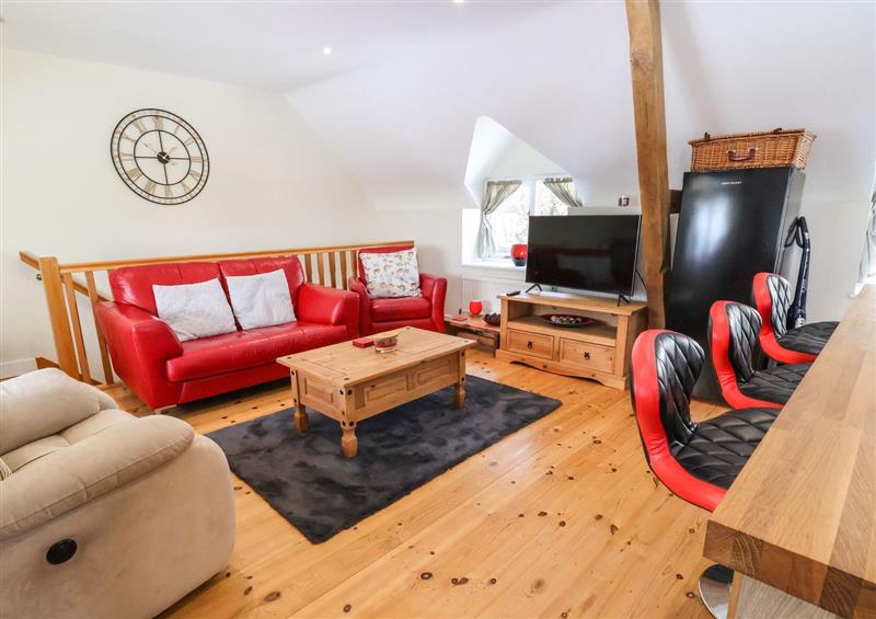 Enjoy the living room at Coach House, Clawdd-Newydd
