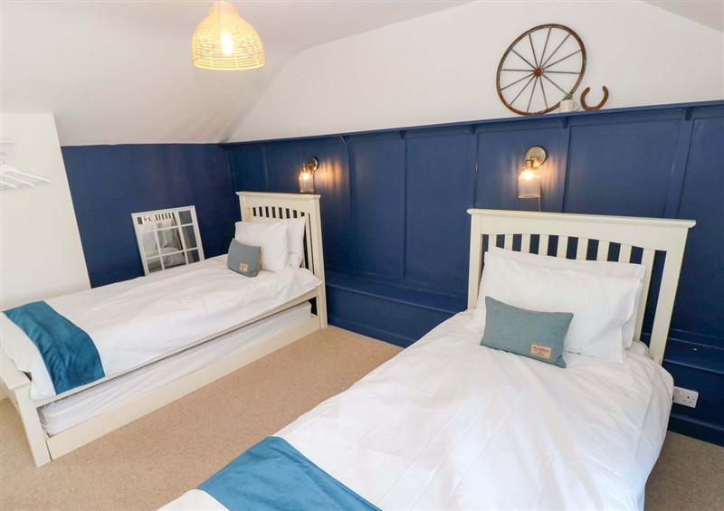 One of the bedrooms at Coach House Cottage, Broad Haven
