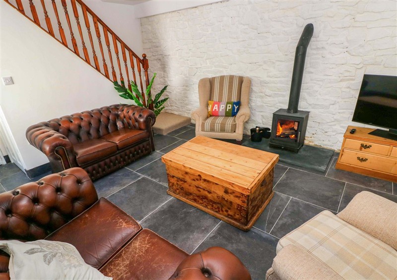 Relax in the living area at Coach House Cottage, Broad Haven