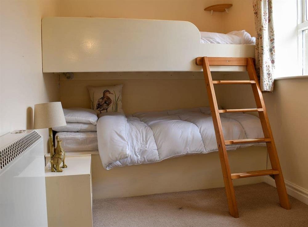 Bunk bedroom at Coach House Cottage in Buckden, North Yorkshire