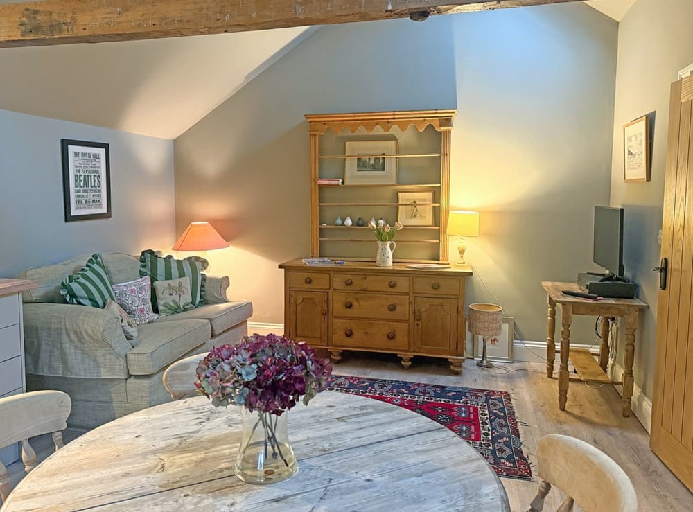 Open plan living space at Coach House Cottage in Kirklington, near Bedale, North Yorkshire