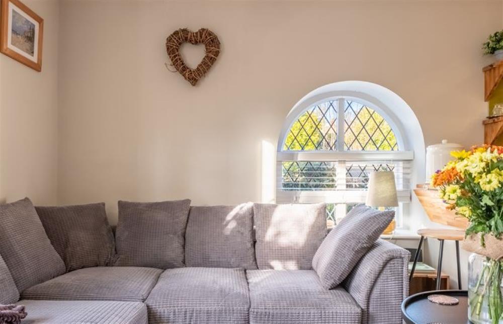 Coach House Cottage: Sitting area  with comfy seating  at Coach House Cottage, Weybourne near Holt