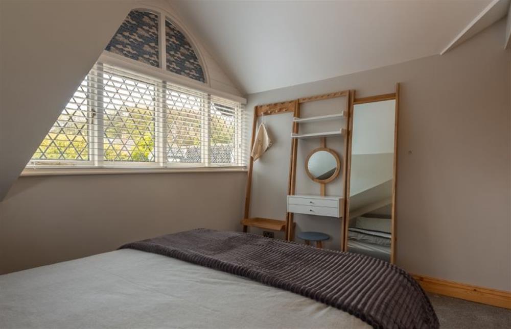 First floor: Bedroom (photo 2) at Coach House Cottage, Weybourne near Holt