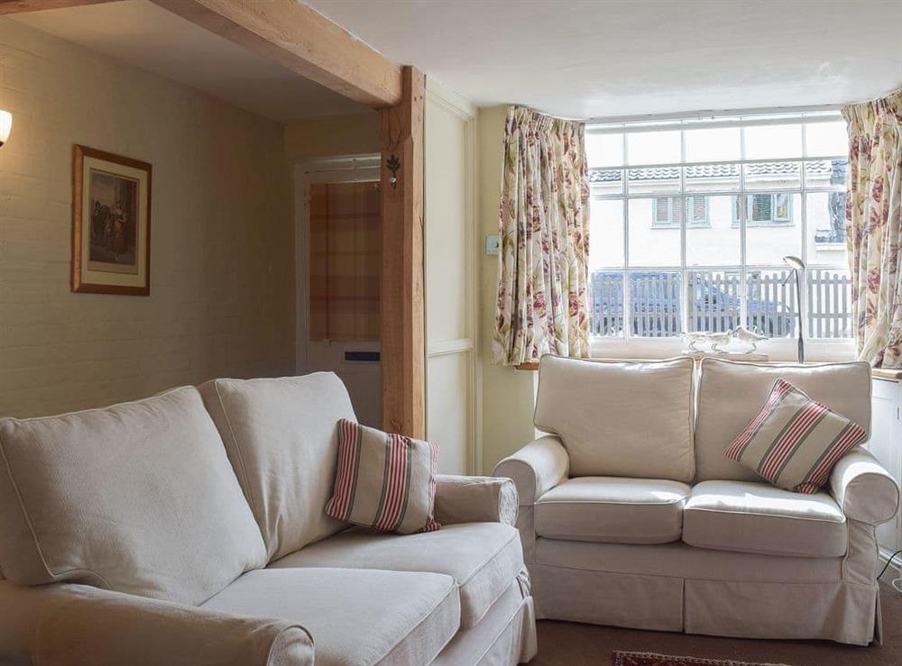 Comfortable living area at Coach House Cottage, 