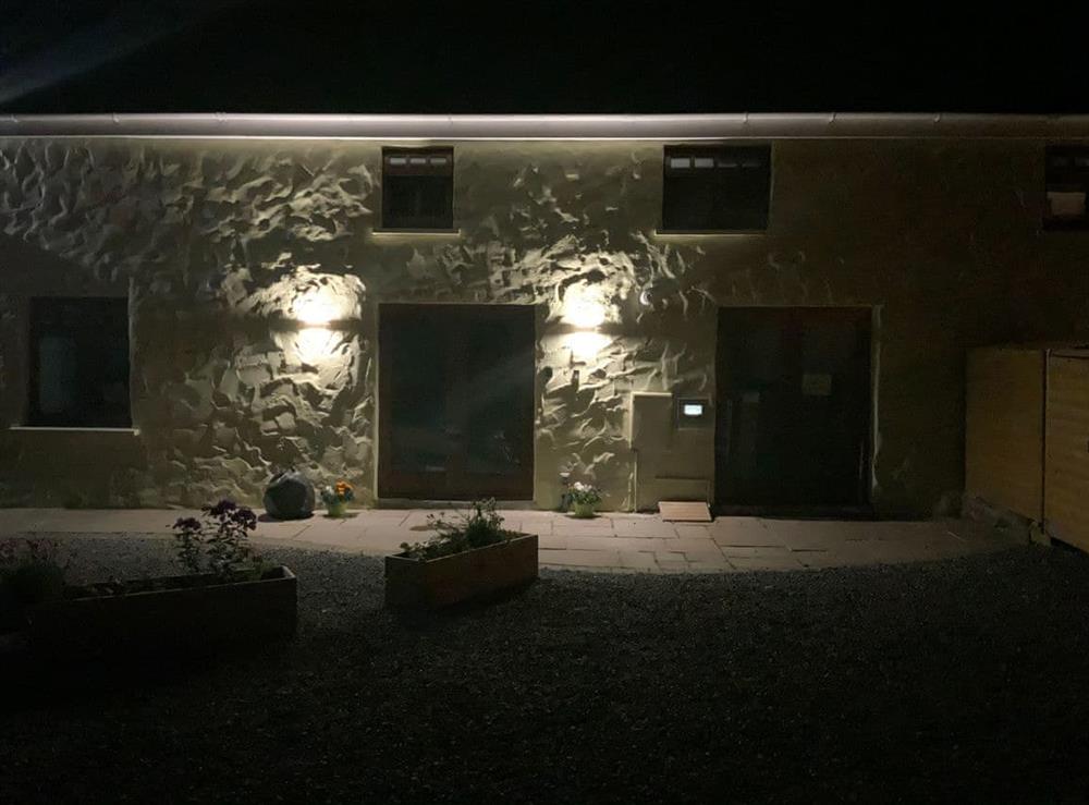 Exterior at night at Coach House in Honeyborough, Dyfed