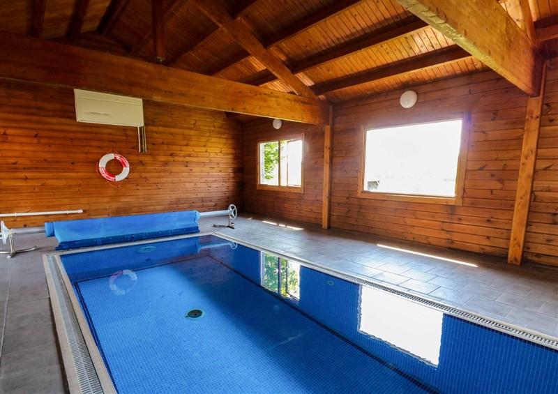 Spend some time in the pool at Coach House, Llangrannog