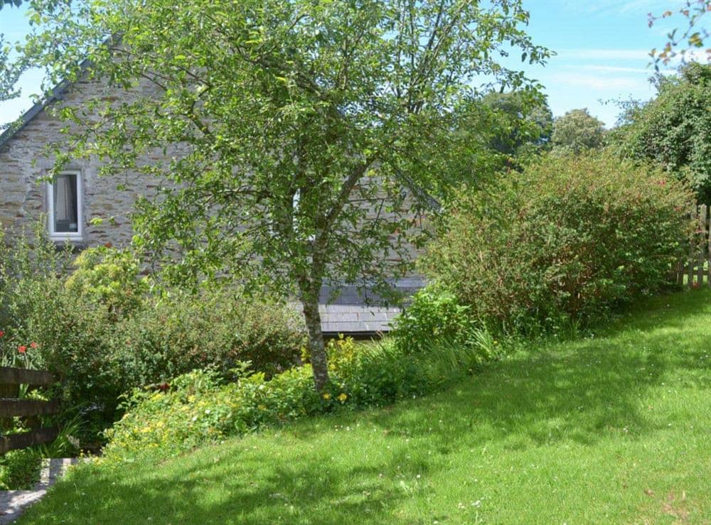 The delightful cottage is set within well stocked gardens at Coach House in Loddiswell, Nr Kingsbridge, South Devon., Great Britain