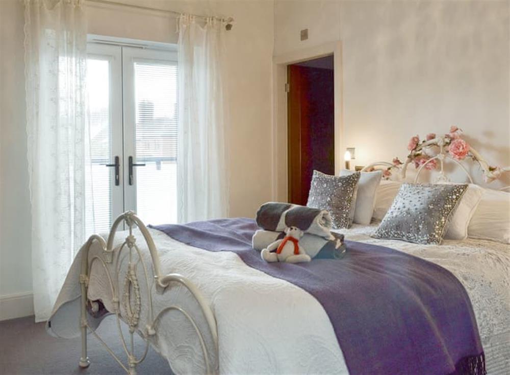 First floor double bedroom with Juliette balcony at Coach House in Lytham St Annes, Lancashire