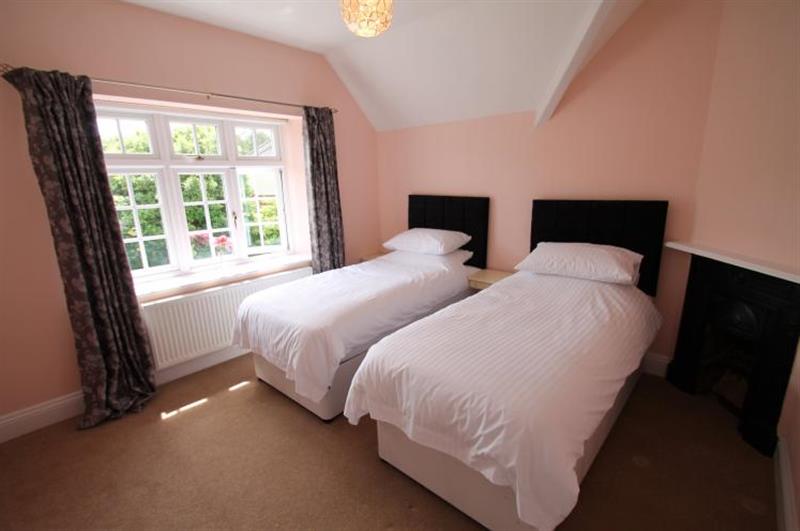 Twin bedroom at Coach House, Old Cleeve