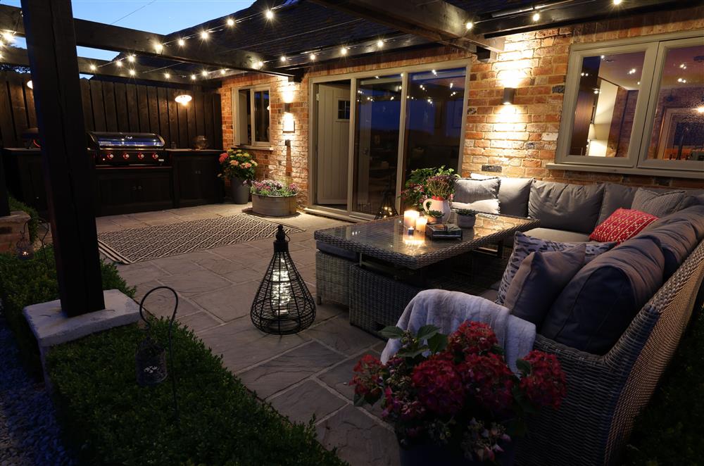 Relax in the inviting outdoor area, perfect for whiling away the evening  at Coach House, Walton, Near Stratford-upon-Avon
