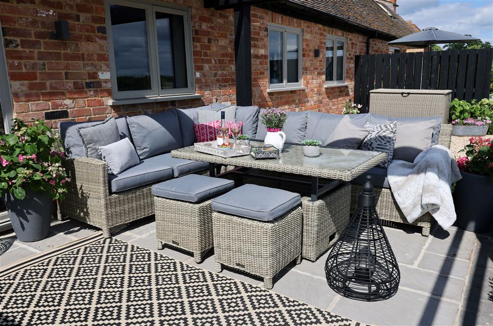 The beautiful patio area, with comfortable seating  at Coach House, Walton, Near Stratford-upon-Avon