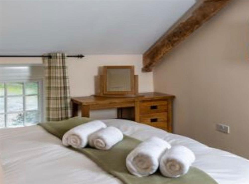 One of the bedrooms at Coachingmans Cottage in Trecastle, Brecon, Powys