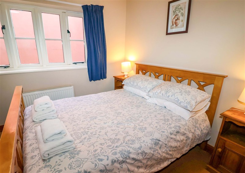 A bedroom in Coachman's Cottage (photo 2) at Coachmans Cottage, Ipswich