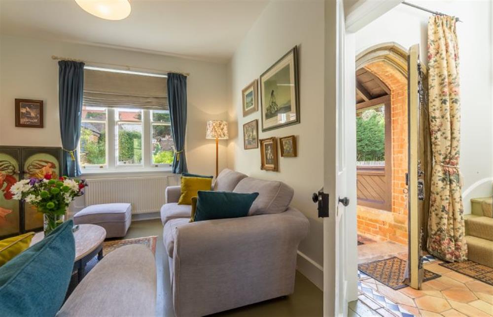 Ground floor: Entrance hallway through to sitting room at Coachmans Cottage, Old Hunstanton