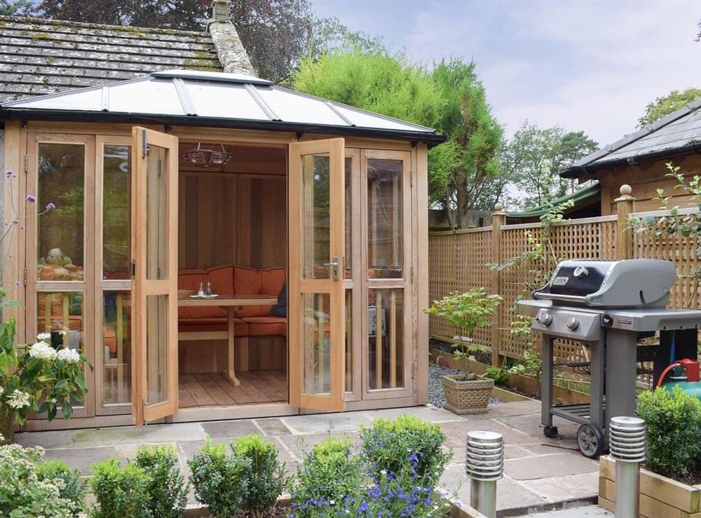 Delightful summerhouse with gas-fired barbecue