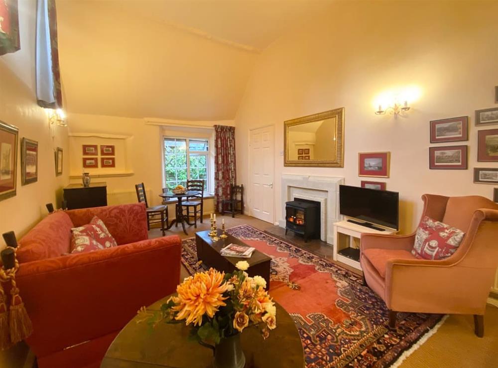 Living room/dining room at Coachmans Cottage in Steeple Ashton, near Trowbridge, Wiltshire