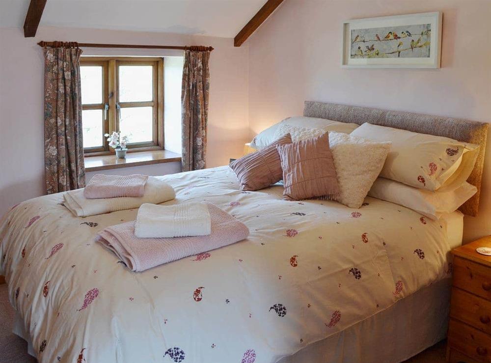 The 6ft double bed can be unzipped to provide two 3ft twin beds if required at Coachmans Cottage in White Cross, near Newquay, Cornwall