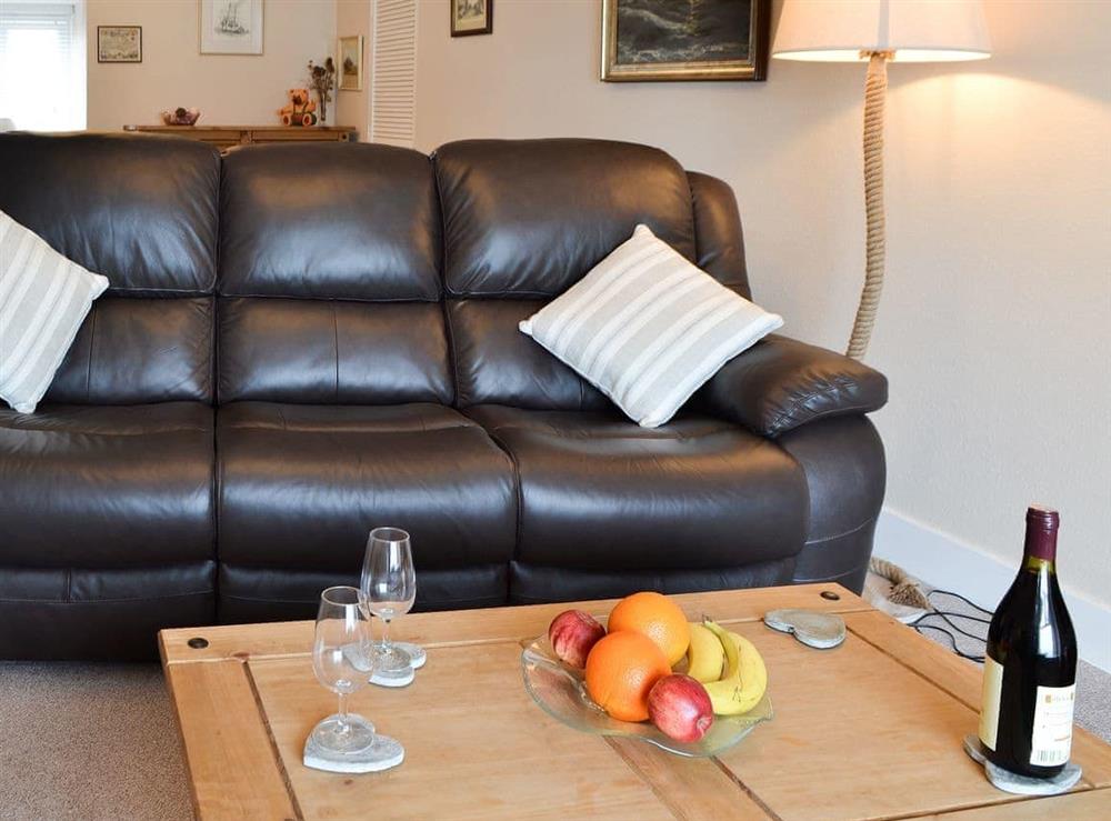 Comfy seating in living room at Coast Lodge in Pevensey Bay, East Sussex