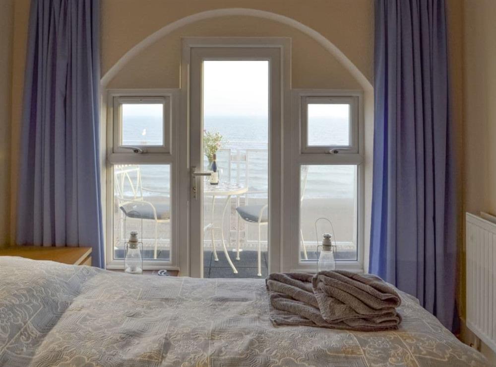 Double bedroom with balcony access at Coast Lodge in Pevensey Bay, East Sussex