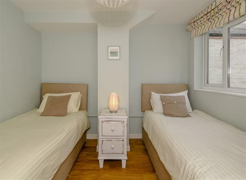 Twin bedroom at Coast View Apartment in Lyme Regis, England