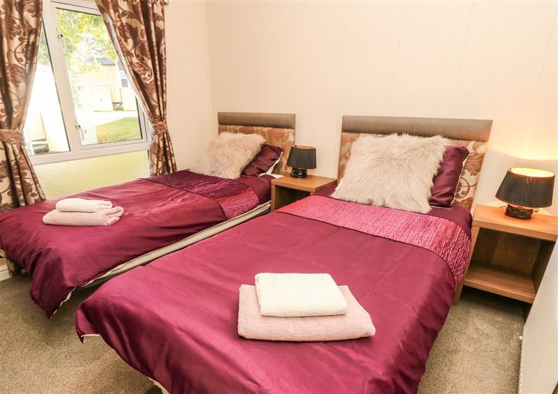 A bedroom in Coast View Lodge at Coast View Lodge, Thorness Bay Holiday Park near Cowes