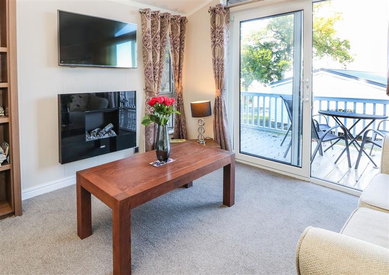 Relax in the living area at Coast View Lodge, Thorness Bay Holiday Park near Cowes