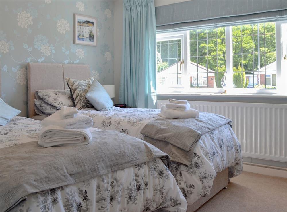 Welcoming twin bedroom at Coastal Dream in Mudeford, near Christchurch, Dorset