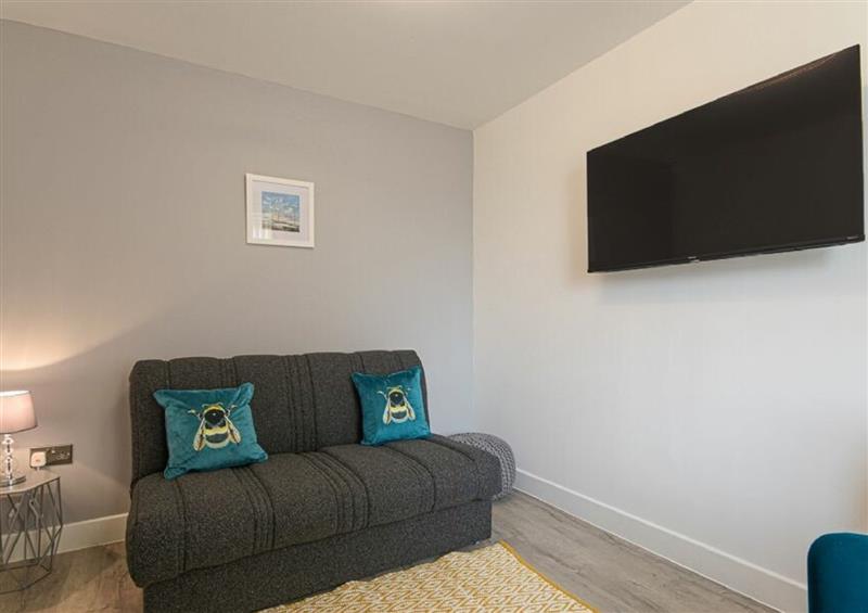 Relax in the living area (photo 2) at Coastal View, Seahouses