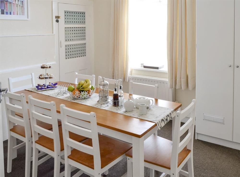 Charming dining area at Coastguard Cottage in Caister-on-Sea, near Great Yarmouth, Norfolk
