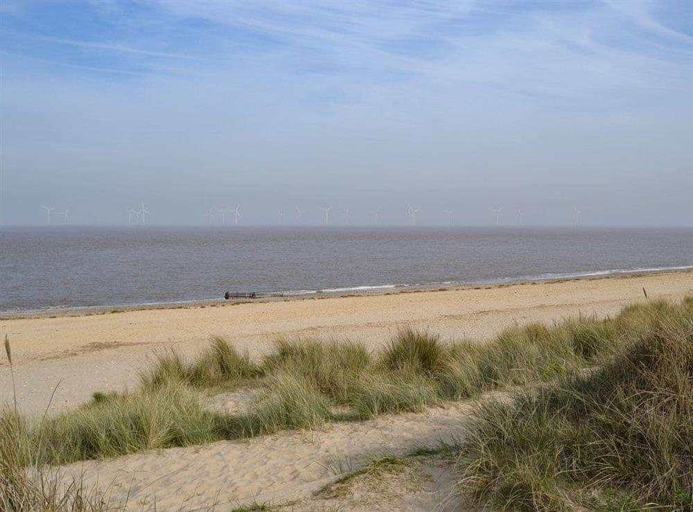 Local sandy beach at Coastguard Cottage in Caister-on-Sea, near Great Yarmouth, Norfolk