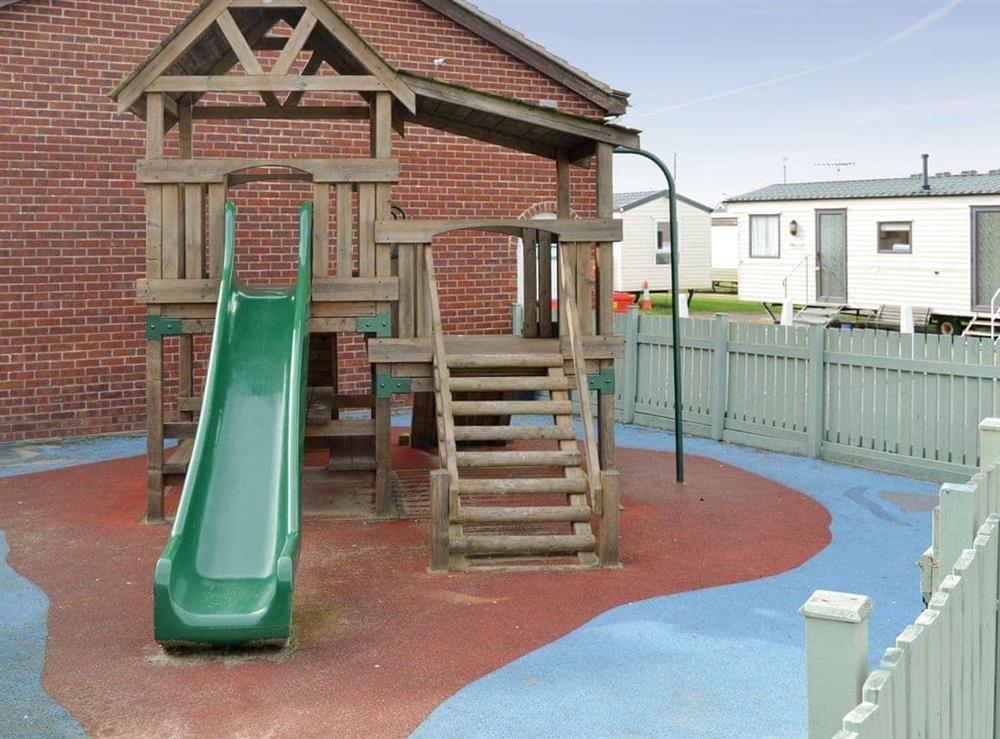 Nearby children’s play-area at Coastguard Cottage in Caister-on-Sea, near Great Yarmouth, Norfolk