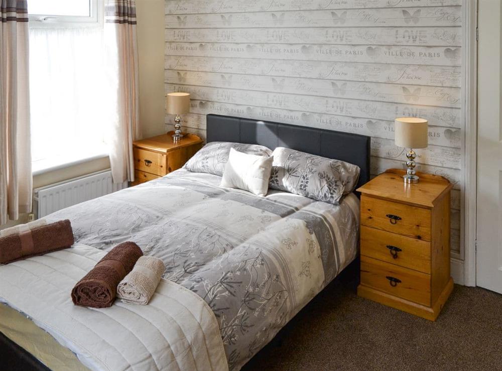 Relaxing double bedroom at Coastguard Cottage in Caister-on-Sea, near Great Yarmouth, Norfolk