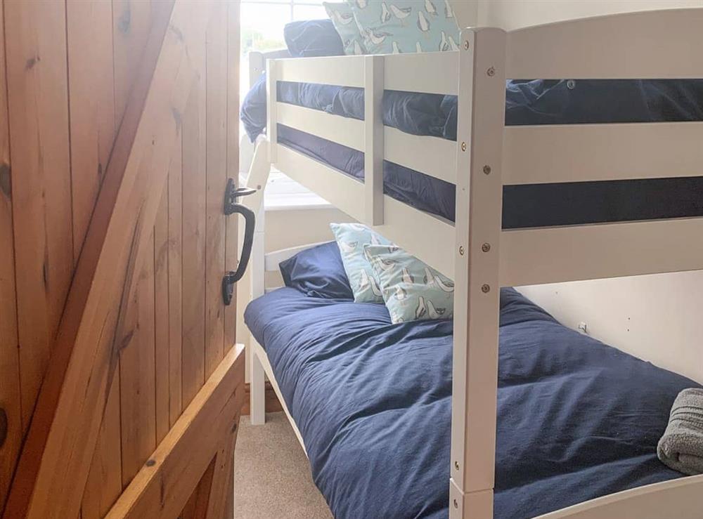 Bunk bedroom at Coastguard Cottage in Chapel St Leonards, near Skegness, Lincolnshire