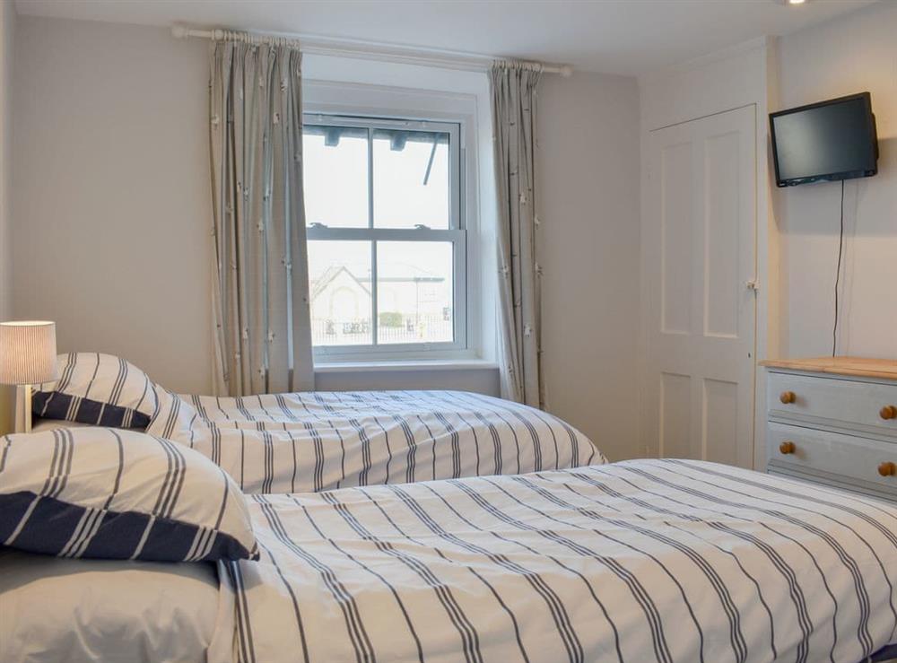 Twin bedroom at Coastguard Cottage in Ryde, Isle of Wight