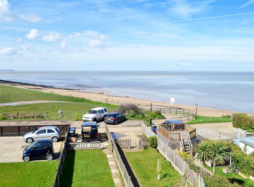 Stunning views, showing the garden and the nearby beach at Coastguard Cottage in Swalecliffe, near Whitstable, Kent