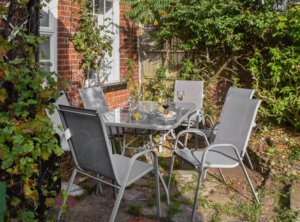 Outdoor eating area at Coastguard Cottages in Caister on Sea, Norfolk