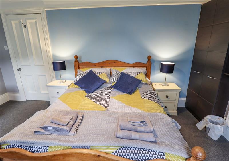 This is a bedroom at Coastguard Cottages, East Riding